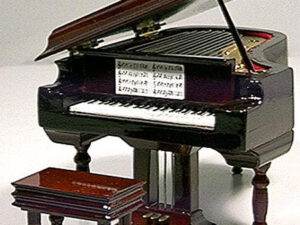 Piano de cola con musica